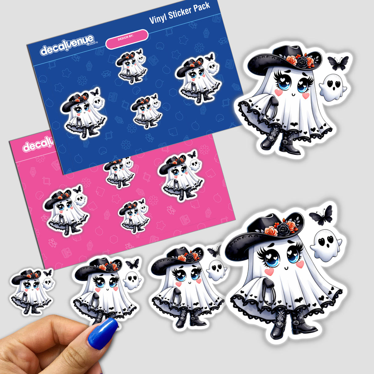 Hand holding a sticker pack featuring a Cute Halloween Ghost with Cowboy Hat, among other cartoon characters.