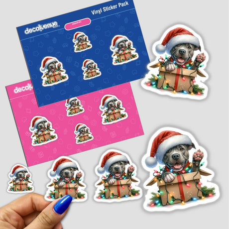 Santa Pitbull Dog in a Christmas Box III sticker features a cartoon pitbull wearing a Santa hat, playfully nestled in a holiday-themed box adorned with festive lights. Available as stickers or digital artwork.