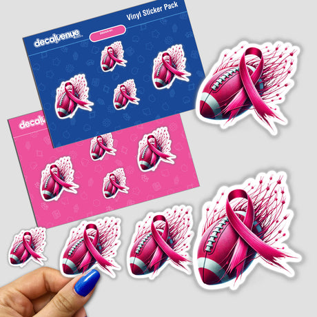 Hand holding a Pink Ribbon Football Breast Cancer sticker, featuring a football wrapped with a pink ribbon, available as a sticker or digital artwork from Decal Venue.