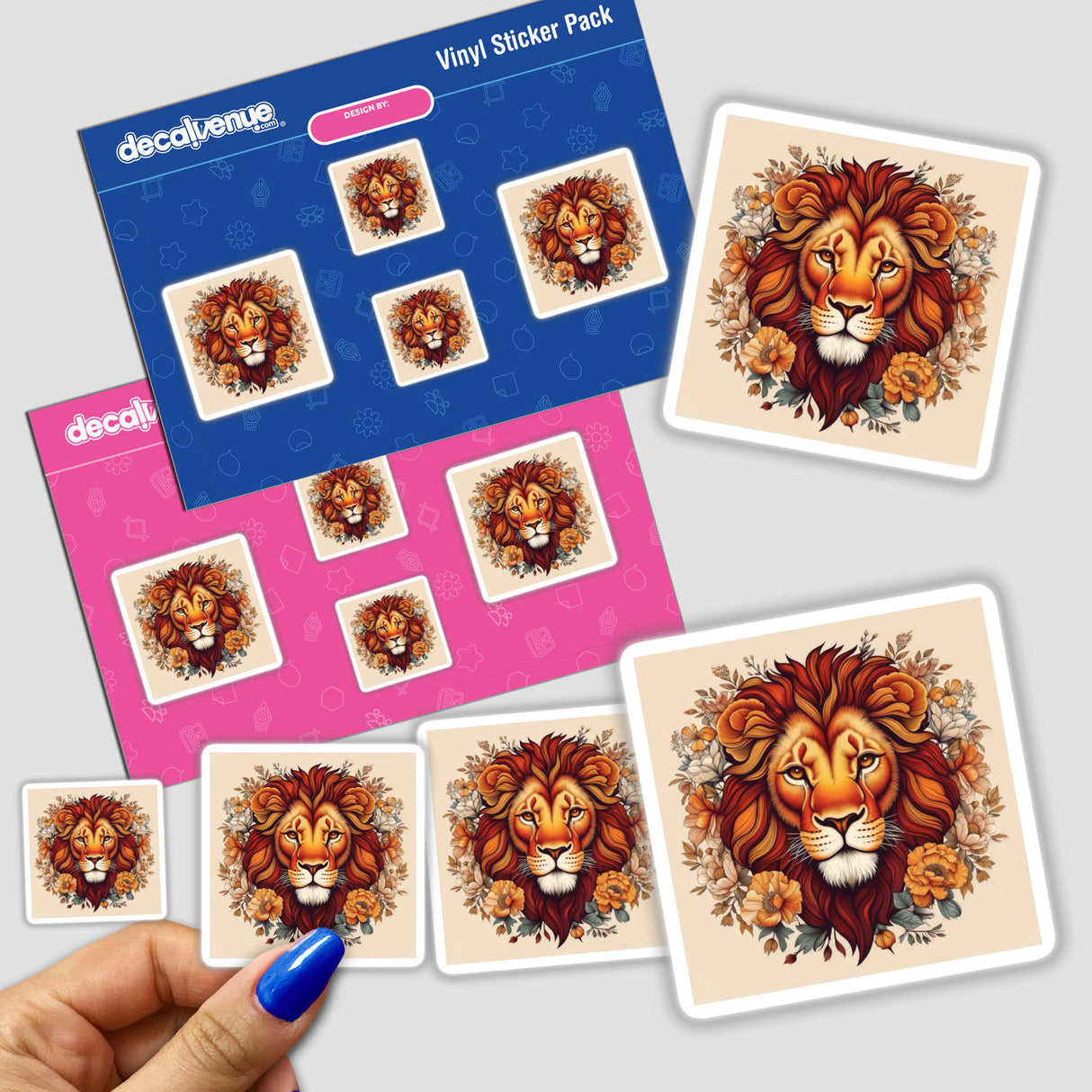 a hand holding a sticker of a lion