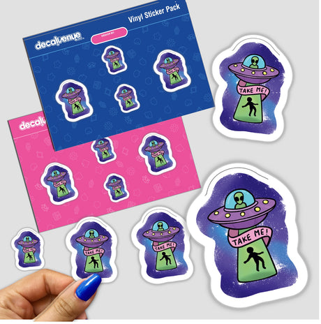 Hand holding a Take Me sticker pack featuring cartoon UFOs and aliens, highlighting unique vinyl designs available as stickers or digital artwork from Decal Venue.