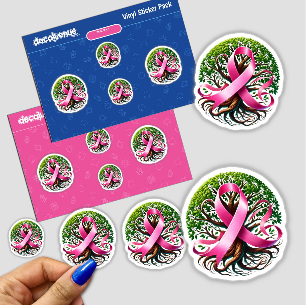 Hand holding Breast Cancer Ribbon sticker intertwined with tree branches from Decal Venue's unique sticker collection.