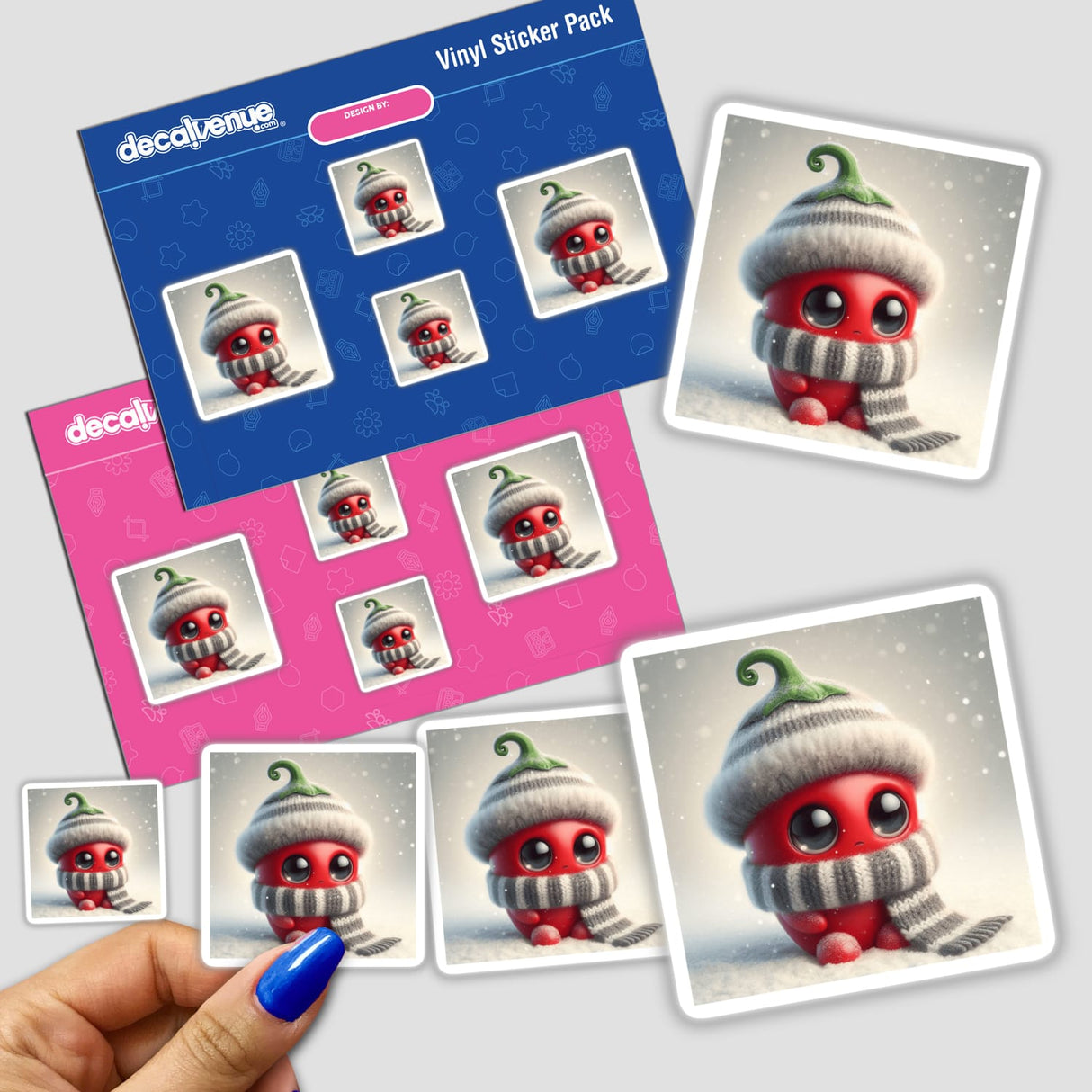 Sticker pack featuring Chili Pepper, a cartoon character with a knitted hat and scarf, held in a hand. Available as stickers or digital artwork from Decal Venue.