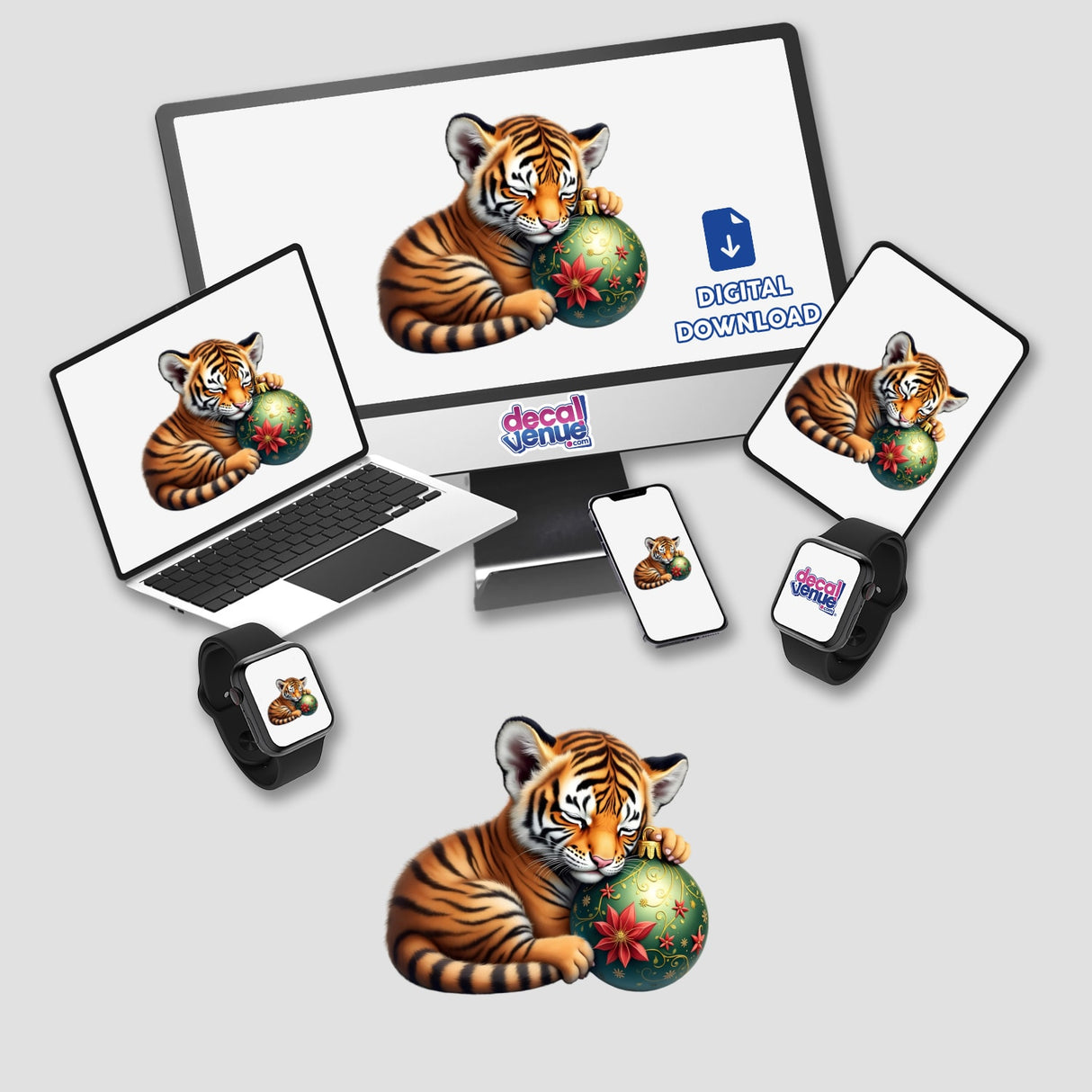 Tiger Cub Sleeping on Christmas Ornament, featured on a computer monitor and laptop, available as stickers or digital artwork, showcasing a cartoon tiger holding a festive ornament.