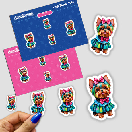 Hand holding a sticker pack titled Yorkie Chic: Cute Dog in Rainbow Floral Dress, featuring cartoon dogs in various outfits. Available as stickers or digital artwork from Decal Venue.