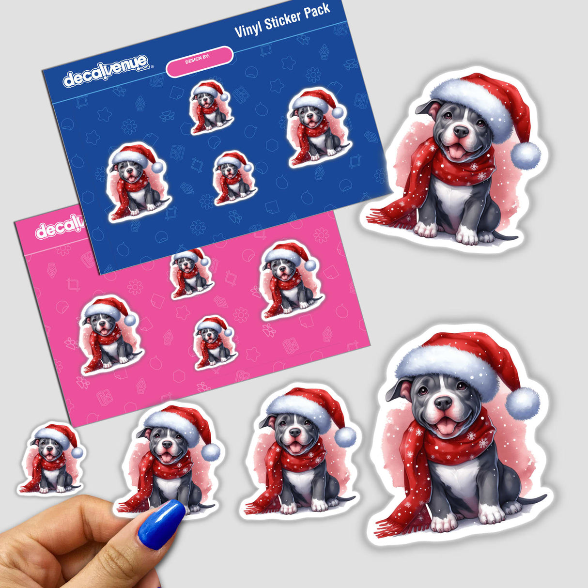 Watercolor Christmas Pitbull Dog stickers depict a cheerful cartoon dog in a Santa hat and red scarf, perfect for holiday-themed decor. Available as stickers or digital artwork from Decal Venue.