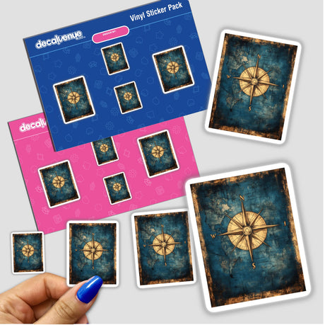 Hand holding Compass Rose on Vintage World Map stickers.