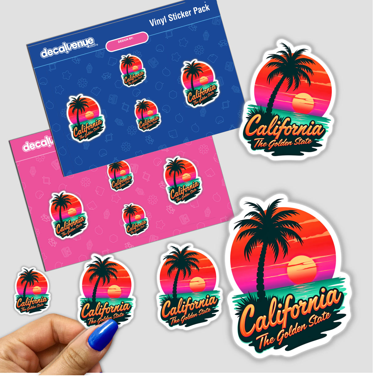 California The Golden State sticker featuring a beach scene with palm trees and a sunset, held by a hand with blue nail polish. Available as a sticker or digital artwork.