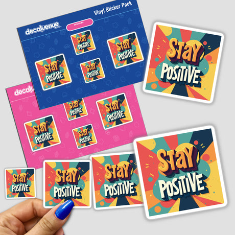 Stay Positive Motivational Sticker for Planners, featuring a hand holding vibrant stickers with uplifting text. Available as stickers or digital artwork, perfect for planners.