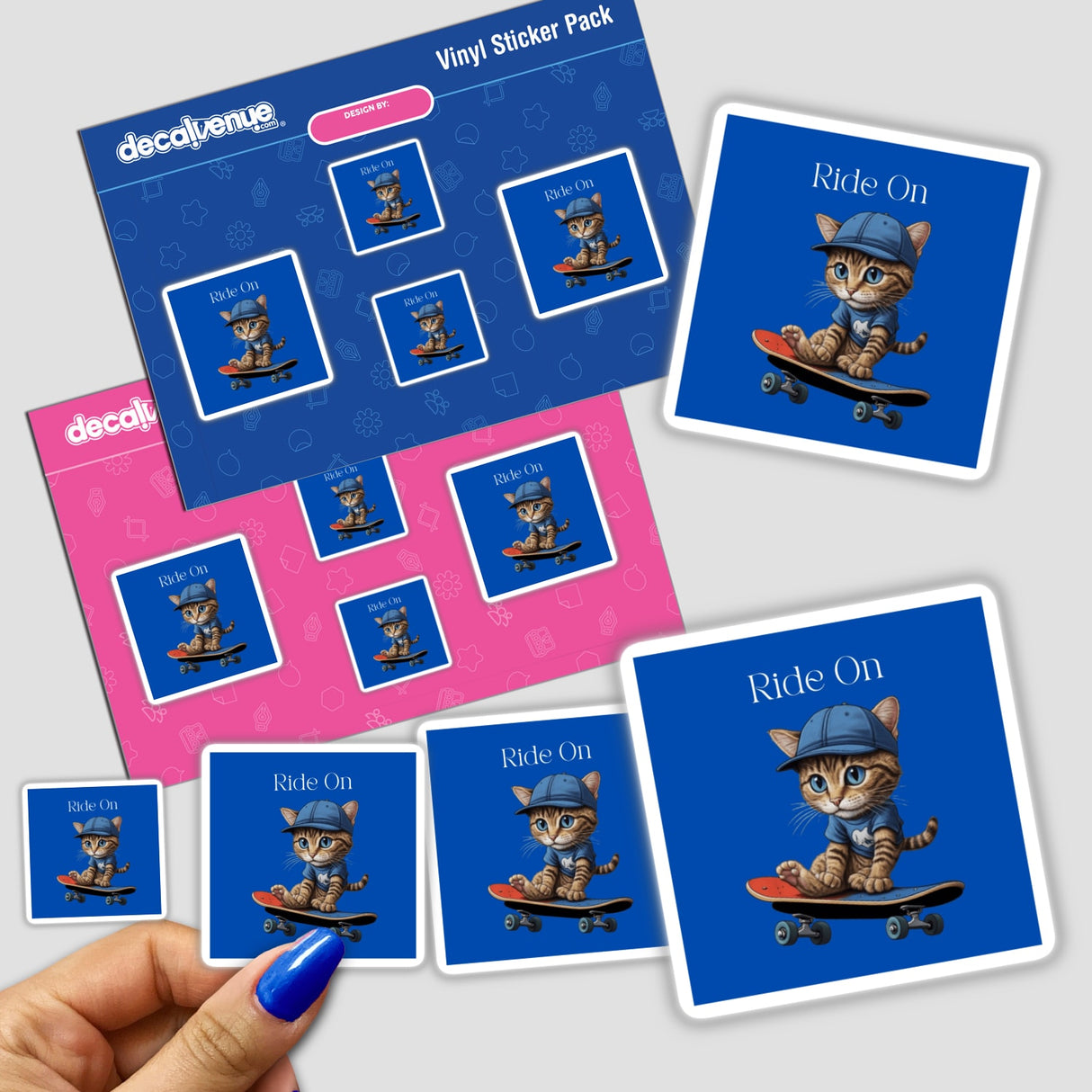 Sticker pack featuring the Skateboarding Tabby, a cartoon cat on a skateboard, held in hand. Available as unique vinyl stickers or digital artwork from Decal Venue.