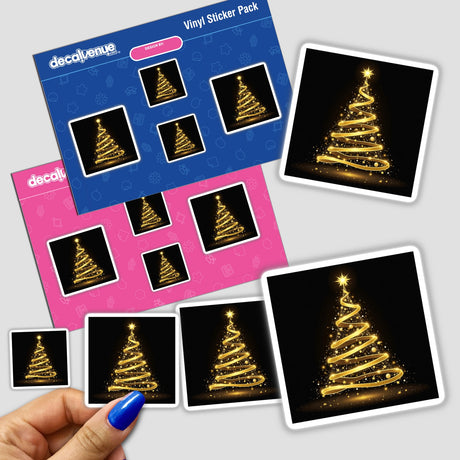 Gold Christmas Tree sticker pack held in a hand, showcasing intricate designs of Christmas trees made from gold ribbon. Available as stickers or digital artwork from Decal Venue.