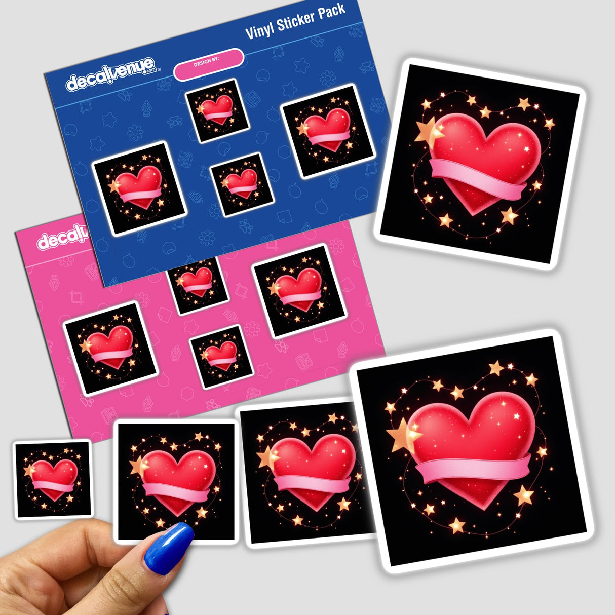 Hand holding a sticker pack featuring the design Red Heart with Pink Ribbon and Fairy Lights, showcasing multiple hearts adorned with pink ribbons and star accents, available as stickers or digital artwork.