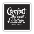 Comfort is the Worst Addiction – Marcus Aurelius Quote Sticker or Clipart, featuring elegant black and white typography, available as stickers or digital artwork, highlighting unique design elements from Decal Venue.