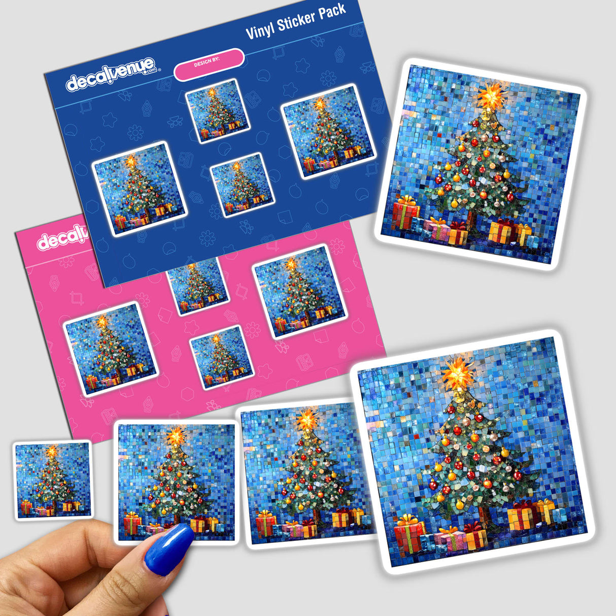 Hand holding a sticker pack featuring a Christmas Tree with Ornaments and Gifts Mosaic, offered by Decal Venue.