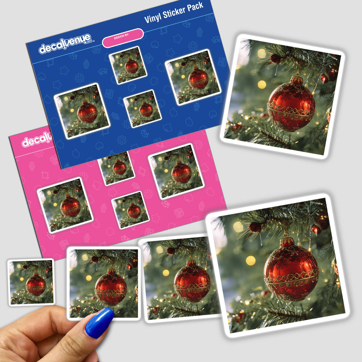 Christmas Ornament Envelope Seal Stickers held in hand, featuring festive designs perfect for holiday cards and gifts. Part of Decal Venue's unique collection of stickers and digital art.