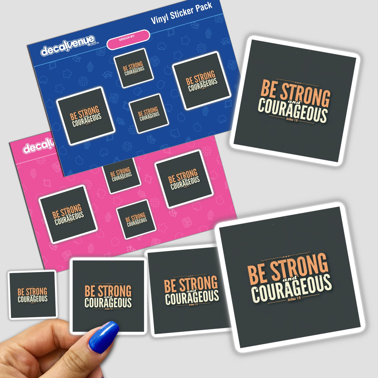 Be Strong and Courageous – Inspired by Joshua 1:9 sticker or clipart. A hand holds the sticker featuring bold text, highlighting an uplifting Christian affirmation, available from Decal Venue.