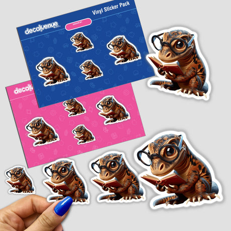 Komodo Dragon With Reading Glasses Open Book sticker featuring a cartoon lizard engrossed in a book, perfect for vinyl sticker enthusiasts or digital art collectors from Decal Venue.