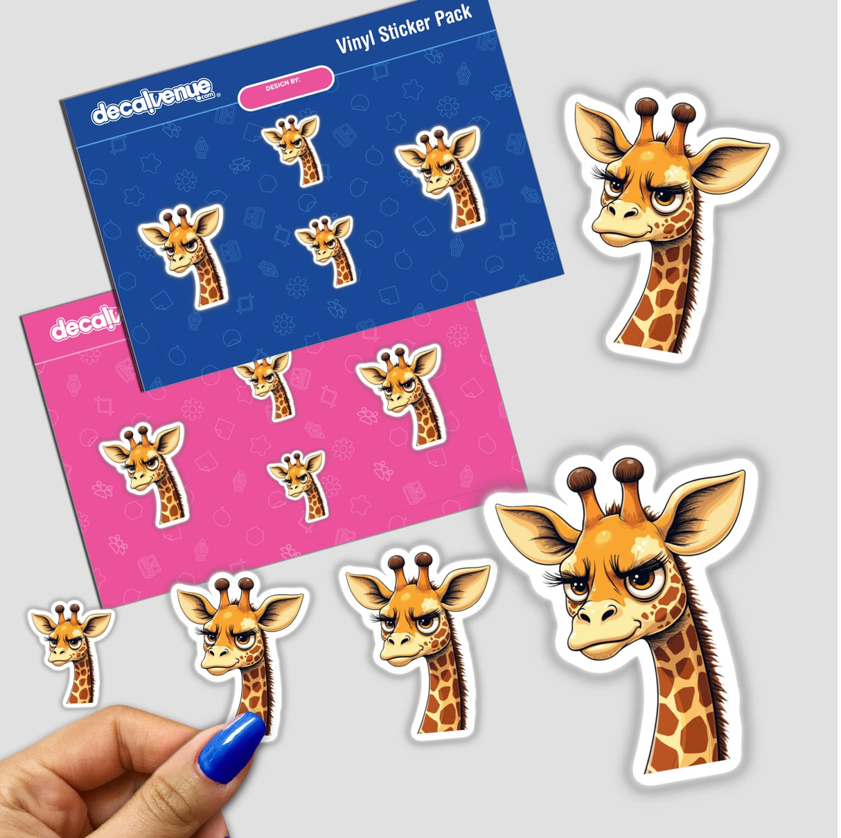 Stickers featuring the Grumpy Giraffe with Long Eyelashes in various sad cartoon expressions, showcased close-up alongside a person's finger for scale.