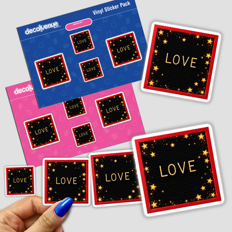 Hand holding a Red Letterboard sticker pack featuring gold LOVE letters and fairy lights, showcasing Decal Venue's unique sticker design.