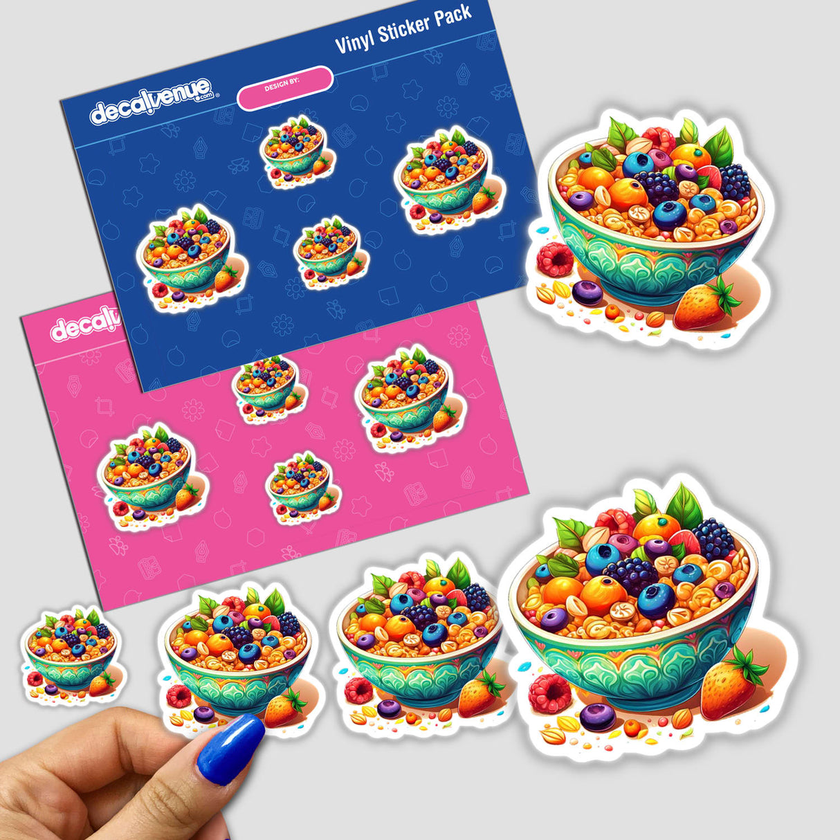 Hand holding a Fruity Cereal sticker pack, featuring vibrant fruit and cereal designs.