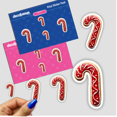 Sticker pack featuring Cute Candy Cane Christmas Cookie Festive Holiday designs, including gingerbread candy cane cookies, and a close-up of a hand holding the stickers.