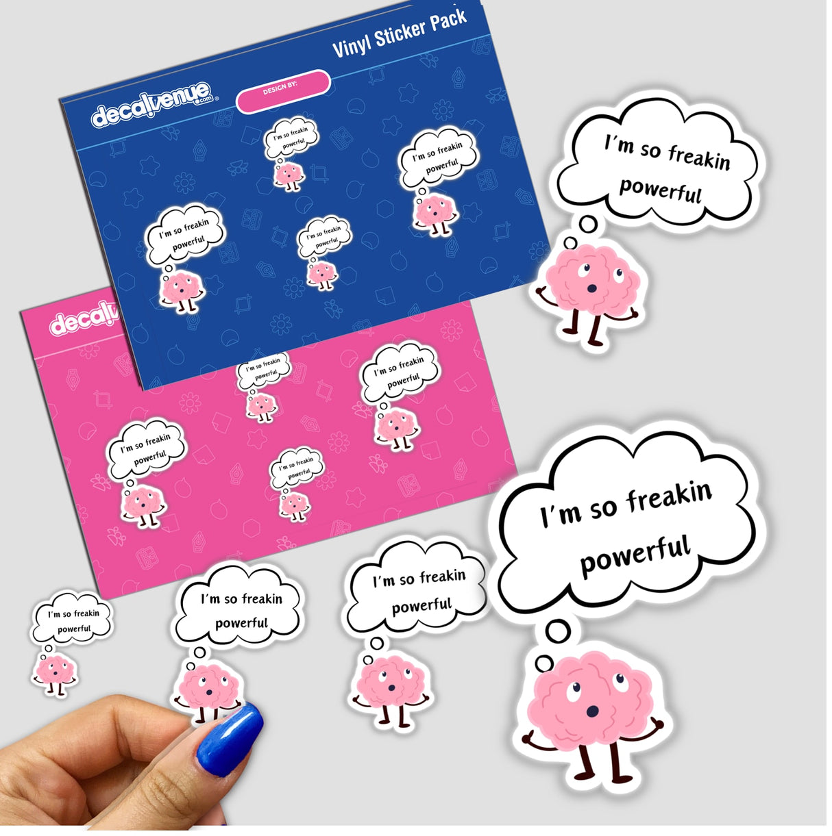 Hand holding Powerful Brain stickers featuring cartoon characters, including a pink brain. Available as stickers or digital artwork from Decal Venue, known for unique stickers and digital art.