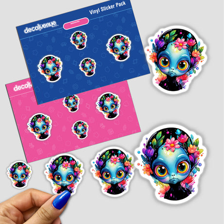 Grumpy Extraterrestrial: Floral Splash Alien Sticker featuring a cartoon alien surrounded by flowers, with a close-up of a person's finger holding one of the stickers.