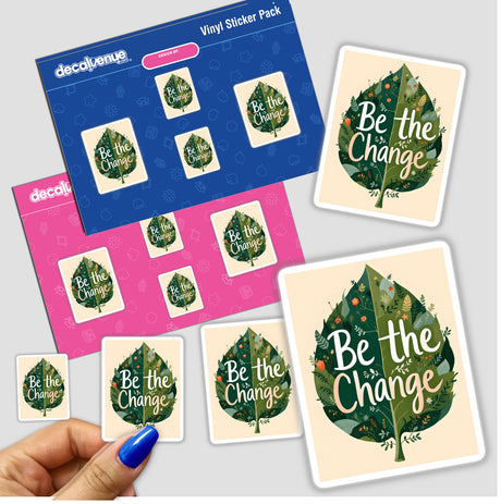 Hand holding a Be the Change nature-inspired sticker featuring white text over a green leaf design, available as a unique sticker or digital artwork from Decal Venue.