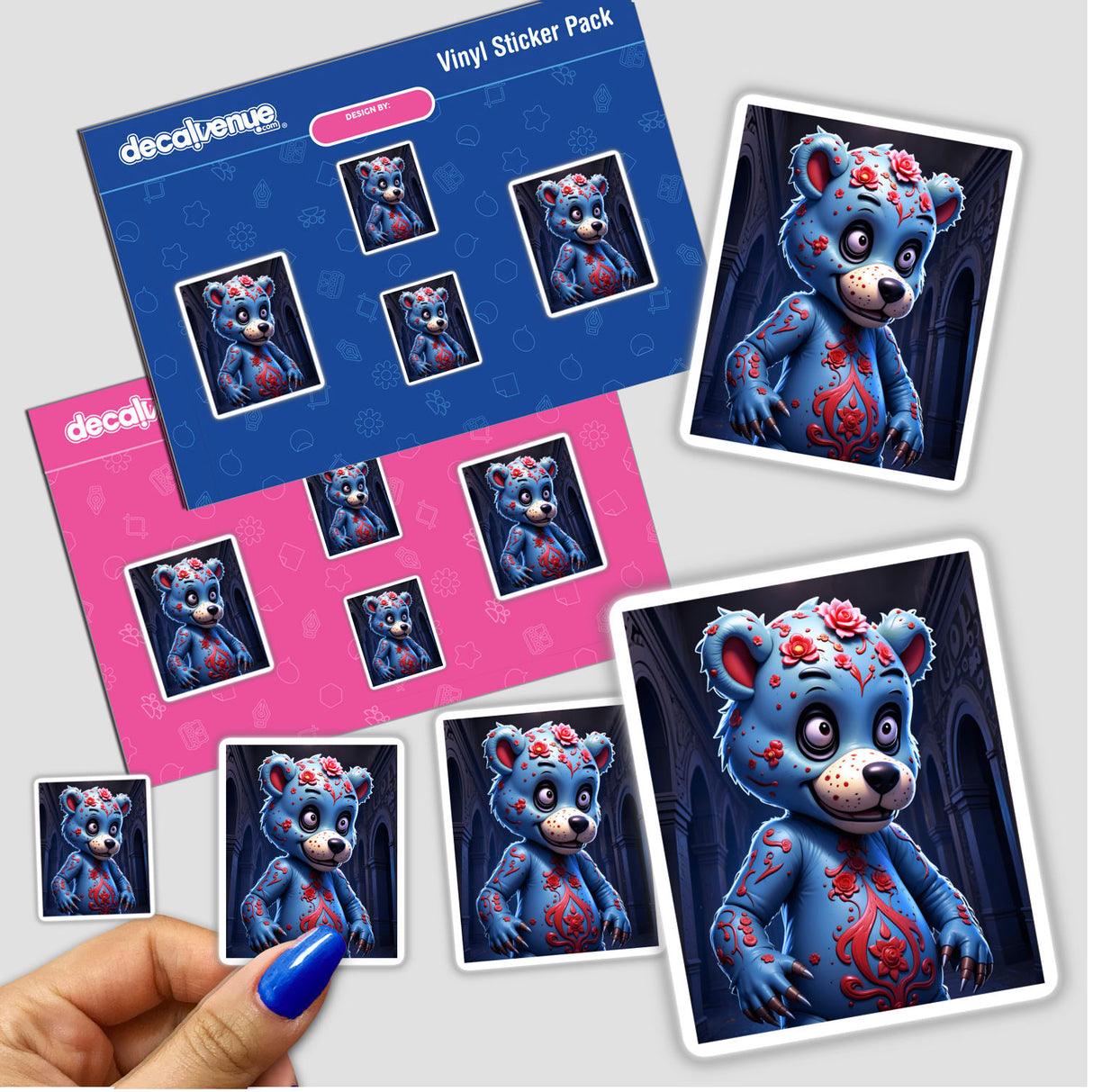 Sticker pack featuring the 'A Macabre Scary Bear' cartoon character in various playful poses, held in a hand. Available as stickers or digital artwork from Decal Venue.