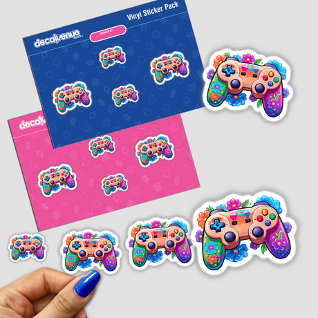 Colorful Gamer: Rainbow Floral Splash Controller Sticker held by a hand, showcasing a vibrant video game controller with floral patterns. Ideal for decorating laptops, notebooks, or gaming setups.