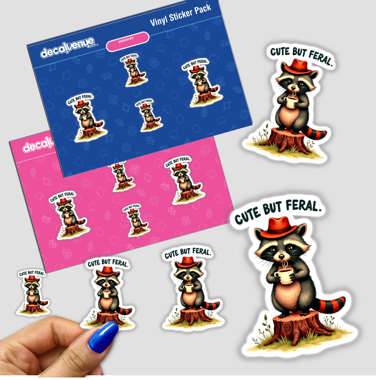 Cute But Feral Raccoon Quote sticker pack featuring cartoon raccoons holding coffee cups, held in hand. Available as stickers or digital artwork, ideal for unique decal collections.