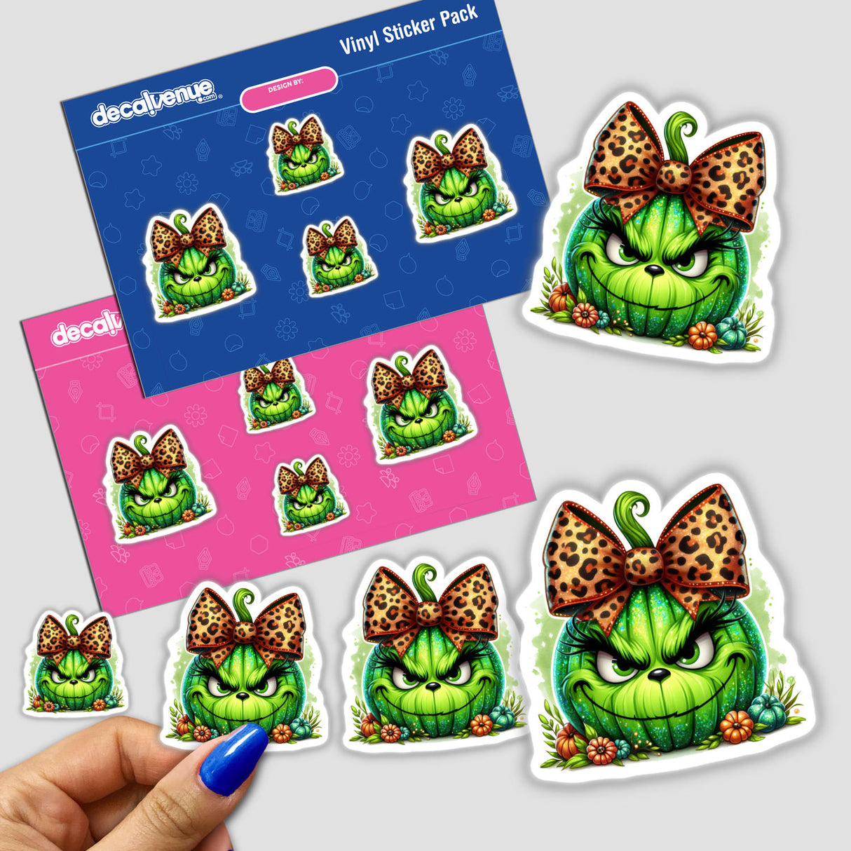 Colorful and fun digital stickers featuring a green grouchy-faced pumpkin with a leopard print bow. The sticker pack is displayed on a pink and blue background, showcasing the variety of sticker designs available.