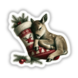 Baby Reindeer Resting Head on Christmas Stocking, available as stickers or digital artwork, featuring a cute baby deer peacefully sleeping in a festive stocking.