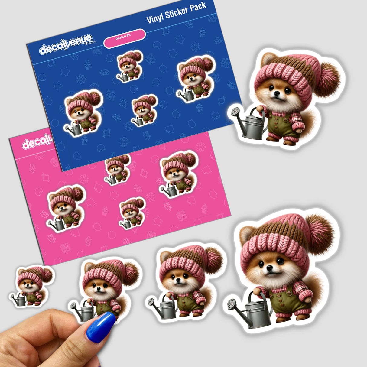 Adorable pomeranian gnome with watering can stickers on a Decal Venue vinyl sticker pack