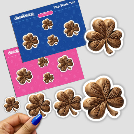 Carved Wood Shamrock sticker pack, featuring a hand holding a sticker and close-ups of intricately carved wooden shamrocks, available as stickers or digital artwork from Decal Venue.