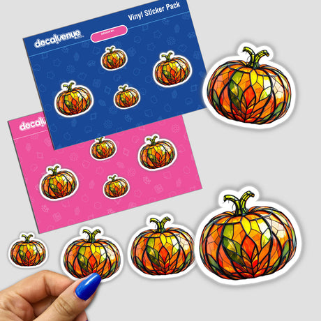 Hand holding a Pumpkin Stained Glass Style sticker pack, showcasing unique pumpkin designs, available as stickers or digital artwork from Decal Venue, known for distinctive stickers and digital art.