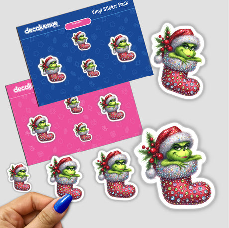 Peeking Santa Green Grouch Jeweled Christmas Stocking sticker, featuring a cartoon green character in a festive stocking, held in a person's hand. Available as stickers or digital artwork from Decal Venue.