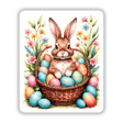 A Cute Easter Bunny in a Basket with Eggs, featuring a rabbit nestled among colorful eggs, available as stickers or digital artwork from Decal Venue.