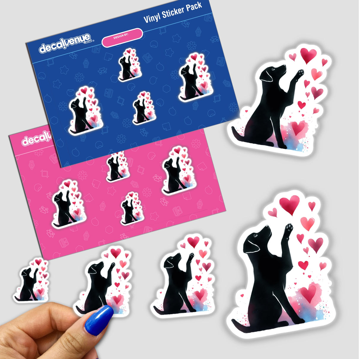 Watercolor silhouettes of dogs reaching for hearts in a vinyl sticker pack, designed by Ella Designz and sold at Decal Venue, an online store featuring unique stickers and digital art.