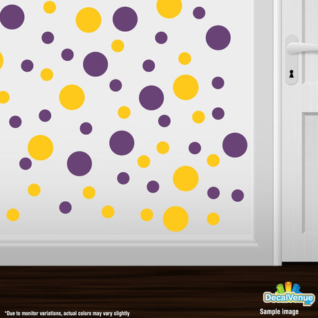 Colorful polka dot circles wall decals in yellow and purple, ideal for decorating a room or office space.