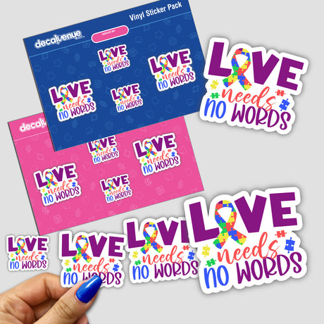 Hand holding the Love needs no words sticker, featuring text and interlocking colorful puzzle pieces.