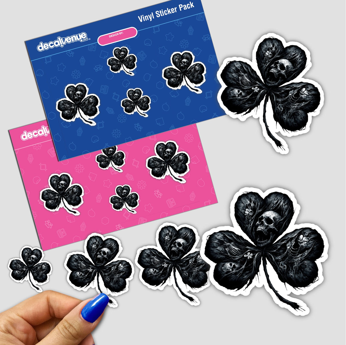 Elegant black and white skeletal shamrock stickers against a vibrant pink and blue background, showcasing a creative and distinctive design from the Decal Venue store.