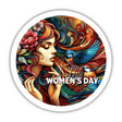 Vibrant digital artwork depicting a woman's profile surrounded by colorful, nature-inspired elements like flowers, birds, and swirling patterns. The image celebrates International Women's Day with a focus on the harmony between the feminine and natural worlds.