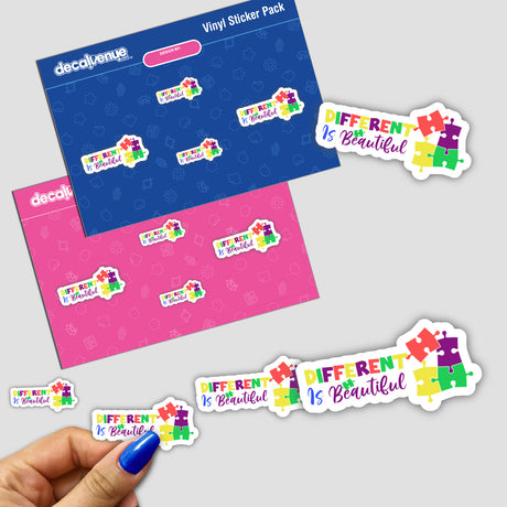 Hand holding a Different is Beautiful sticker pack, featuring colorful puzzle piece designs.