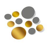 Grey and metallic gold polka dot circles wall decals in various sizes.